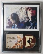 AUTOGRAPHS: A framed and glazed photo and signed CD cover from The Fratellis single launch party