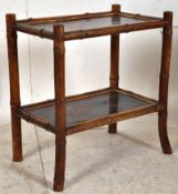 A Victorian aesthetic movement bamboo occasional / side table with inset decorative panels to top