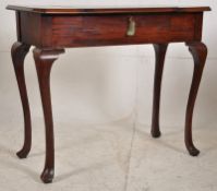 An Edwardian metamorphic writing table by Britisher, standing on cabriole legs with letter racks