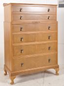 A good quality 1930's Queen Anne style chest of drawers. Raised on stup cabriole legs having an
