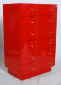 An Ikea serpentine fronted contemporary chest of drawers having polished metal handles