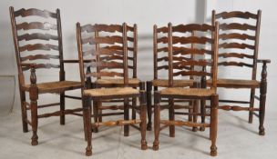 A set of six north country oak ladderback dining chairs (4 standard / 2 carvers) beign raised on