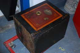 A Victorian cast iron safe bearing original paintwork having lock to the front.