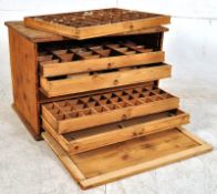 An early 20th century pine haberdashery / egg collectors cabinet box, with 6 drawers behind a