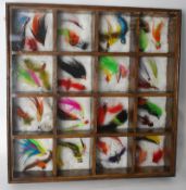 A set of cased Canadian fishing flys in a custom designed carry / display case. 45 in total.