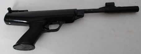A BSA Scorpion air pistol, complete with plastic extension for cocking pistol