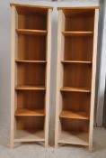 A pair of large contemporary Ikea display cabinets. The upright bodies with adjustable within. 190cm