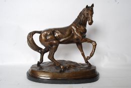 After Antoine-Louis Barye. A very large cast bronze marley horse. The prancing stallion being