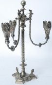 A 19th century Victorian Empire silver plate candelabra. The trefoil base having lion mask finials
