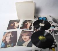 BEATLES RECORD: The Beatles ` White Album ` vinyl LP complete with original poster and full colour