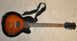 A DeArmon electric Gibson style guitar in tobacco sunburst finish with humbucking pickups and