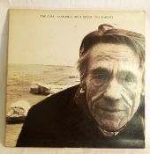 A collection of vinyl to include such records as: The Cure Standing on a Beach The Singles,