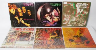 Six vinyl record albums by The Cramps to include The Smell of Female, A Date with Elvis, Stay Sick,