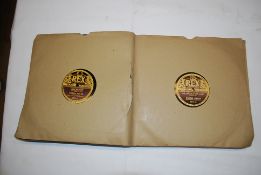 A record folder containing 12 78 singles bt Gracie Fields, all in very good condition