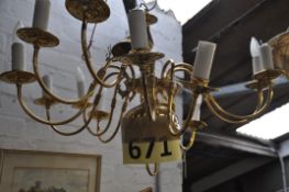 A 12 branch brass chandelier.