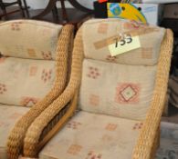 2 good quality modern whicker conservatory armchairs with cushions bearing compliant fire labels
