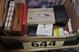 A mixed lot to include cigar boxes, tin money box, tins and other items.