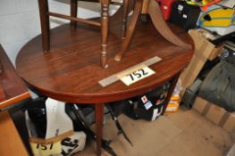 A mahogany dining table
