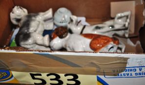 A box of china animal figurines to include dogs, english sheepdog etc including one by Goebbels