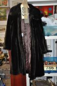 A vintage ladies fur coat by Astaka