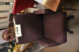 A brown swivel chair