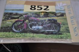 A wall hanging metal reproduction tin sign for Ariel motorbikes, in original packaging.
