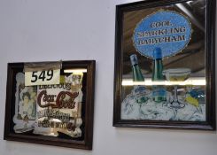 A vintage Coca Cola adverting mirror along with a Babycham mirror.
