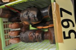 A box of wooden African heads.