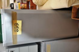 A Beko silver finish mid height fridge