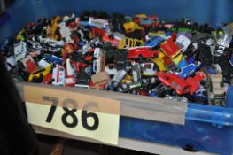 A large box of assorted toy diecast model cars including Hotwheels, Matchbox, Lledo and many others