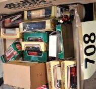 A collection of toy cars, mostly in boxes to include Lledo, models of yesteryear etc