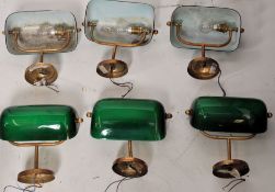 A set of 7 wall mounted green glass and gilt metal bankers lights / lamps. All unwired, as seen