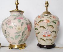 Two vintage china Kutani lamps, each on a wooden base and one with original pink matching shade.