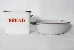 A vintage enamel bread bin complete with lid together with a washing bowl of metal and enamel