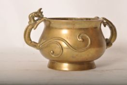 An early 20th / late 19th century brass / bronze Chinese oriental censor bowl, with earlier Qing