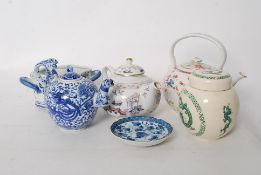 A Chinese blue and white teapot with dragon handle and spout, character marks to base, together