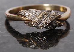 A 9ct gold diamond sweetheart ring 15 pts size W