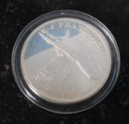 A Republic of Marshall islands 1995 F-4 Phantom II $50 silver proof coin.