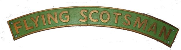 A cast metal reproduction railway train locomotive name plate for the `Flying Scotsman,` Hand