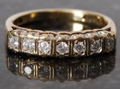 A 9ct gold seven stone diamond half eternity ring approx 25 pts, size L