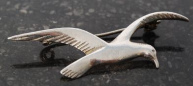 Art deco bird brooch stamped silver 925 and cms within a losenge. 5cms wing tip