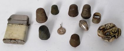 A mixed lot to include vintage Thorens cigarette lighter, a resin made frog Netsuke and a