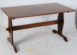 A good quality solid oak refectory dining table constructed in the 18th century style. Lyre shaped