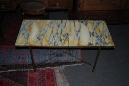 A retro marble topped coffee table