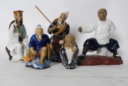 A collection of five Chinese oriental clay warrior / fighting figures. Each with makers impression