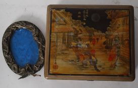 Japanese dragon pewter picture frame together with a painted lacquer painted trinket box