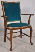 An Edwardian mahogany bedroom / salon chair with cabriole legs in a turquoise velour upholstery.