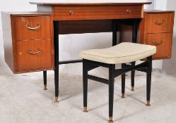 A retro 1960`s Nathan furniture teak and ebonised suspension set desk / dressing table and stool.
