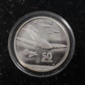 A Republic of the Marshall islands 1991 Spitfire $50 silver proof coin.