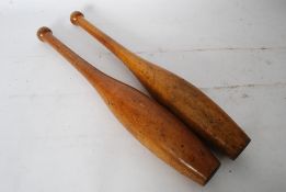 Pair of original large Indian clubs 56 cms long